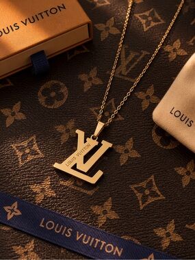 Louis Vuitton Gold LV Monogram Pendant Necklace - Women's Jewelry